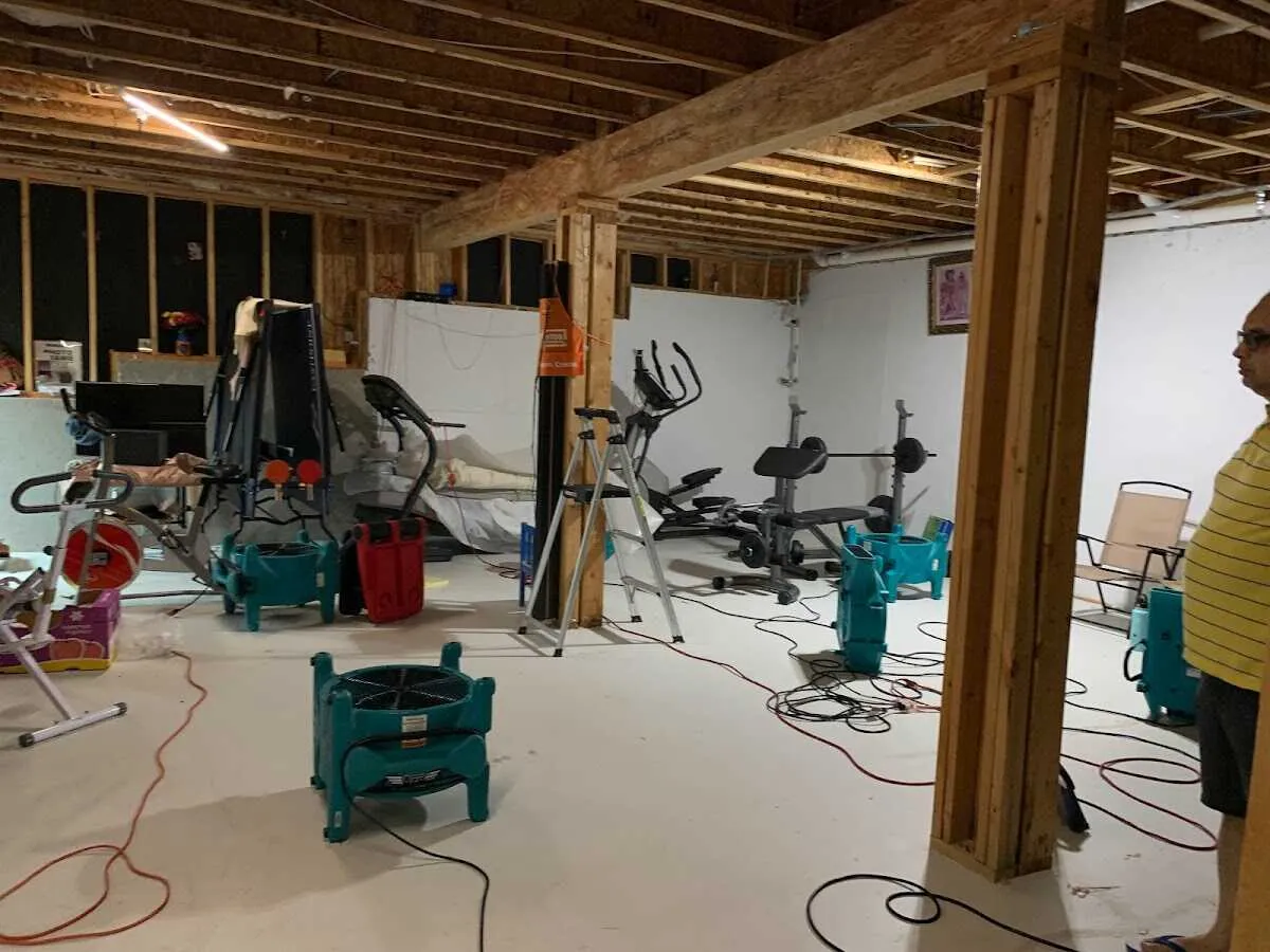 Basement drying equipment setup for Contents Cleaning & Restoration in Redwood Falls